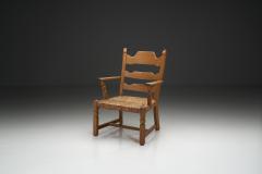 Henning Kjaernulf Armchair with Woven Seating in the manner of Henning Kj rnulf Denmark 1960s - 4561662