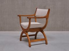 Henning Kjaernulf Henning Kj rnulf Kurul Armchair in Oak and Leli vre Boucl Denmark 1960s - 3634213