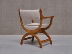 Henning Kjaernulf Henning Kj rnulf Kurul Armchair in Oak and Leli vre Boucl Denmark 1960s - 3634216