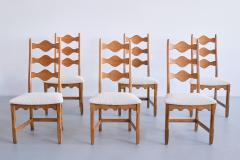 Henning Kjaernulf Set of 12 Henning Kj rnulf Dining Chairs Oak and Ivory Boucl Denmark 1960s - 3285674