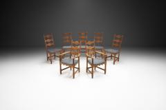 Henning Kjaernulf Set of Seven Oak Dining Chairs by Henning Kj rnulf Denmark 1960s - 2977476