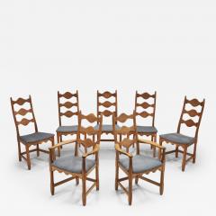 Henning Kjaernulf Set of Seven Oak Dining Chairs by Henning Kj rnulf Denmark 1960s - 2997640