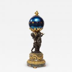 Henry Dasson Henry Dasson a French Gilt and Patinated Bronze Marble and Enamel Annular Clock - 1203552