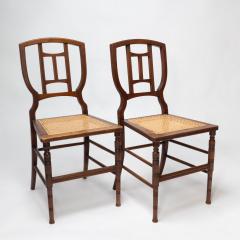Henry William Batley H W Batley attr Jas Shoolbred Pair of Aesthetic Movement cane seat beech chairs - 4191837