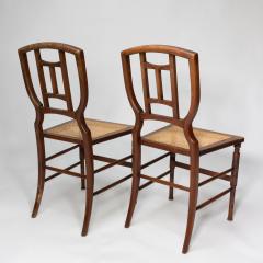 Henry William Batley H W Batley attr Jas Shoolbred Pair of Aesthetic Movement cane seat beech chairs - 4191840