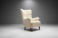 High Back Easy Chair in Sheepskin with Stained Beech Legs Scandinavia 1950s - 2009302