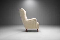 High Back Easy Chair in Sheepskin with Stained Beech Legs Scandinavia 1950s - 2009304