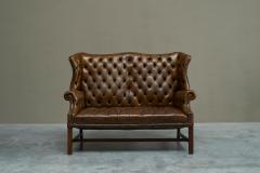 Highly Original Tufted English Wingback Settee in Patinated Leather 1900 - 4677238