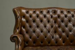 Highly Original Tufted English Wingback Settee in Patinated Leather 1900 - 4677251