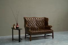Highly Original Tufted English Wingback Settee in Patinated Leather 1900 - 4677296