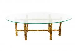 Hollywood Regency Giltwood and Oval Glass Coffee Table - 2498488