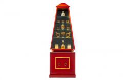 Hollywood Regency Obelisk Cabinet Finished in Red Lacquer Gold Leaf circa 1960 - 2992357