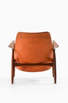 Ib Kofod Larsen Easy Chair in Leather and Teak by Ib Kofod Larsen 1950s - 4565035