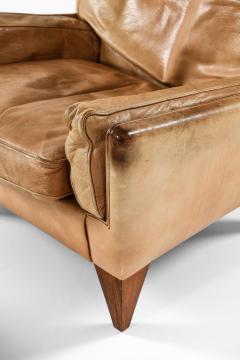 Illum Wikkels Easy Chair in Leather and Rosewood with Stool by Illum Wikkels 1960s - 4507712