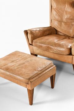 Illum Wikkels Easy Chair in Leather and Rosewood with Stool by Illum Wikkels 1960s - 4507714