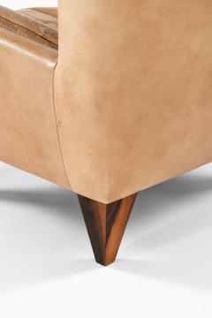 Illum Wikkels Easy Chair in Leather and Rosewood with Stool by Illum Wikkels 1960s - 4507720