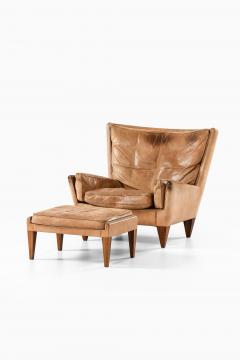 Illum Wikkels Easy Chair in Leather and Rosewood with Stool by Illum Wikkels 1960s - 4508667