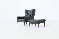 Illum Wikkelso Illum Wikkelso lounge chair and foot stool in leather Denmark 1960 - 4099039