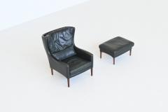 Illum Wikkelso Illum Wikkelso lounge chair and foot stool in leather Denmark 1960 - 4099043