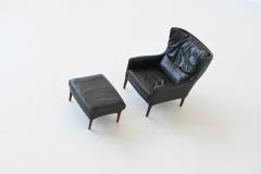Illum Wikkelso Illum Wikkelso lounge chair and foot stool in leather Denmark 1960 - 4099045