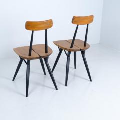 Ilmari Tapiovaara Pair of Ilmari Tapiovaara Pirkka chairs Laukaan Puu Finland 1950s - 4423392