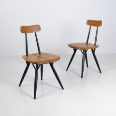 Ilmari Tapiovaara Pair of Ilmari Tapiovaara Pirkka chairs Laukaan Puu Finland 1950s - 4423393