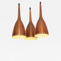 Impressive Copper Chandelier with Performated Shades and Tropic Wood Details - 549202