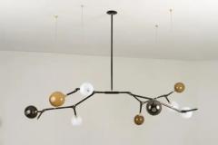 Isabel Moncada MANTIS 9 pendant light Lost Wax Bronze Vintage Finish 9 White Glass Globes - 3837884