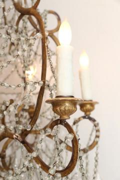 Italian Chandelier in Wood Gilt Iron and Glass - 4123091
