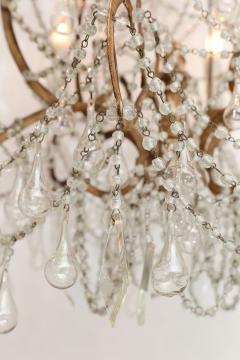 Italian Chandelier in Wood Gilt Iron and Glass - 4123093