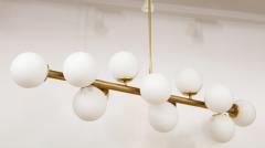 Italian Mid Century Modern Brass Horizontal Twelve Globe Chandelier circa 1960 - 3013526