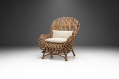 Italian Wicker Armchair with Upholstered Seat Cushion Italy 1960s - 3105329