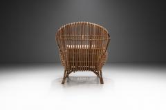 Italian Wicker Armchair with Upholstered Seat Cushion Italy 1960s - 3105332