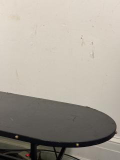 Jacques Adnet 1940s BLACK LEATHER BRASS STUDDED EDGE OBLONG COFFEE TABLE WITH BLACK IRON BASE - 4278363