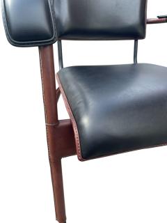 Jacques Adnet 1950s Stitched leather and m tal rocking chair by Jacques Adnet - 4551655