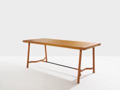 Jacques Adnet Jacques Adnet oakwood and red leather dining table 1950 - 4585890
