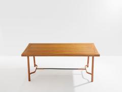 Jacques Adnet Jacques Adnet oakwood and red leather dining table 1950 - 4585893
