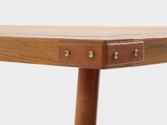 Jacques Adnet Jacques Adnet oakwood and red leather dining table 1950 - 4585898
