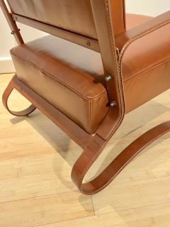 Jacques Adnet Jacques Adnet pair of brown hand stitched leather lounge chairs - 2768037