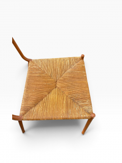 Jacques Adnet Pair of Stitched leather and rattan chairs by Jacques ADNET - 4827918