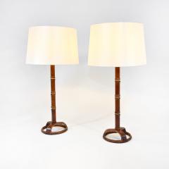 Jacques Adnet Pair of chic stitched leather table lamps - 1789722