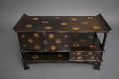 Japanese Black Lacquer Tana tiered tea cabinet with Gold Crest Design - 717220