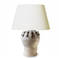 Jean Besnard Table lamp with applied looping ornament in the style of Jean Besnard - 1163701