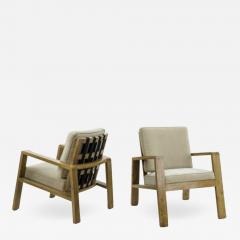 Jean Roy re Jean Royere pair of documented oak slender lounge chairs - 835883