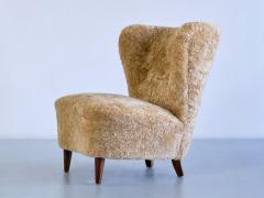 Johannes Brynte Pair of Johannes Brynte Lounge Chairs in Sheepskin and Ash Wood Sweden 1940s - 3325591