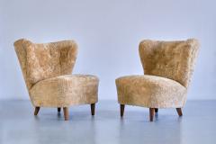 Johannes Brynte Pair of Johannes Brynte Lounge Chairs in Sheepskin and Ash Wood Sweden 1940s - 3325592