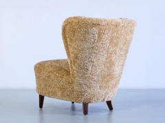 Johannes Brynte Pair of Johannes Brynte Lounge Chairs in Sheepskin and Ash Wood Sweden 1940s - 3325593