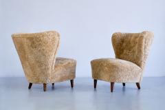 Johannes Brynte Pair of Johannes Brynte Lounge Chairs in Sheepskin and Ash Wood Sweden 1940s - 3325595