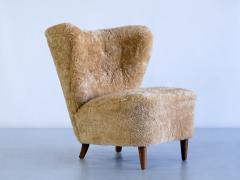 Johannes Brynte Pair of Johannes Brynte Lounge Chairs in Sheepskin and Ash Wood Sweden 1940s - 3325596