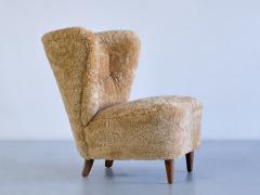 Johannes Brynte Pair of Johannes Brynte Lounge Chairs in Sheepskin and Ash Wood Sweden 1940s - 3325597